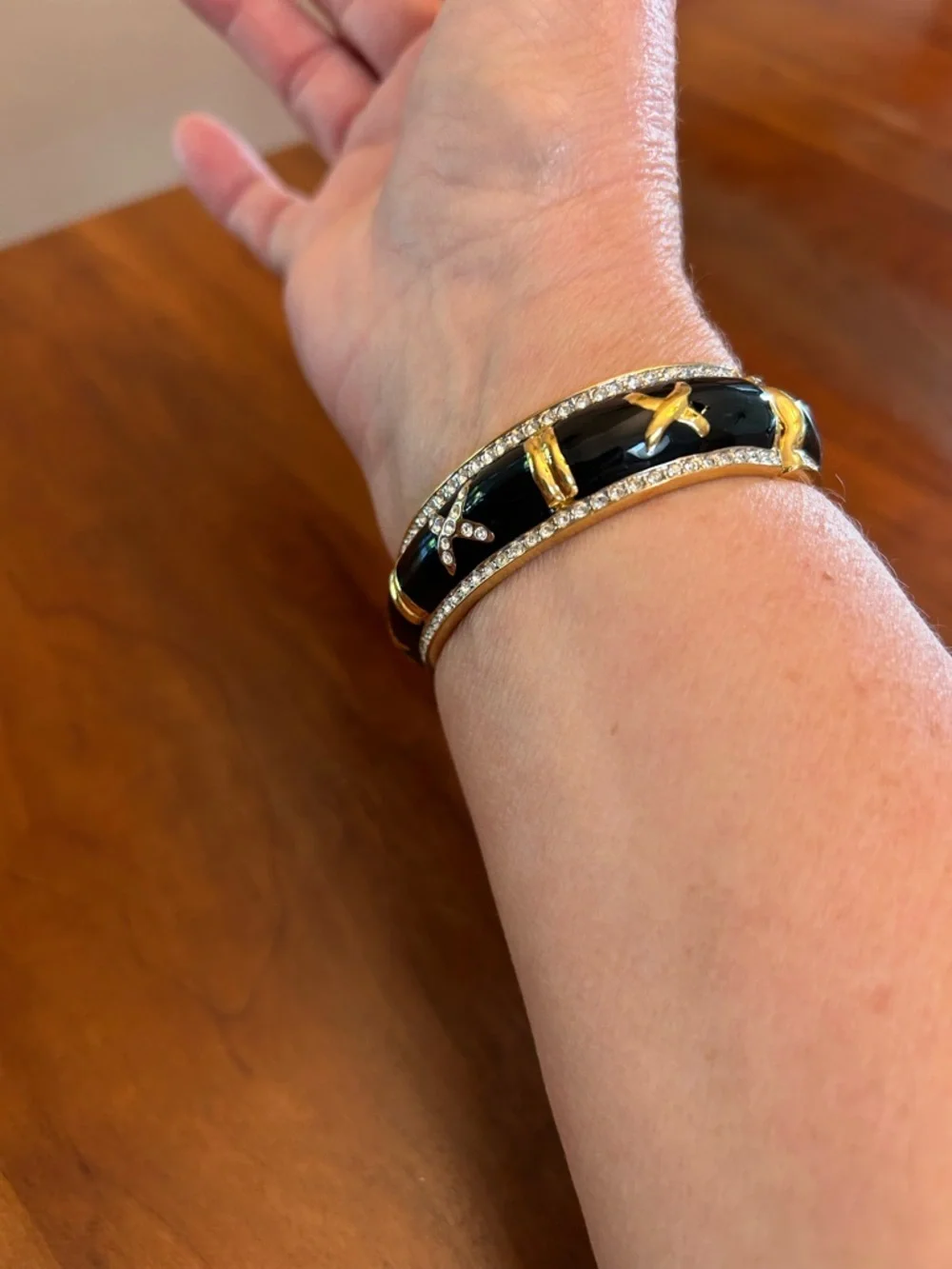 Gold-Tone Black Enamel X Accent Bangle Bracelet